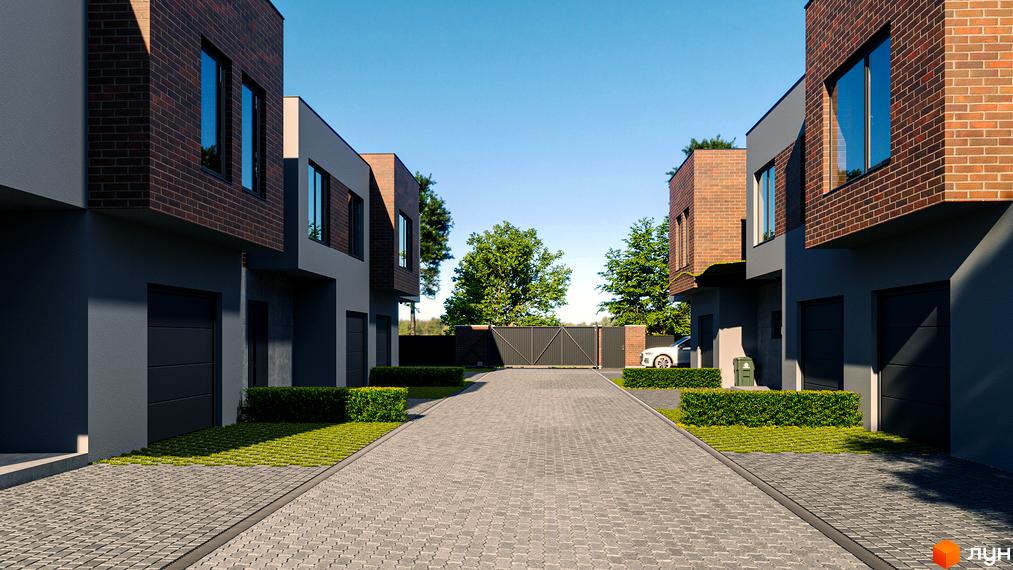 Таунхауси Chelsea Town з цегляним фасадом та індивідуальними гаражами. Прибудинкова територія з бруківкою та зеленими насадженнями.