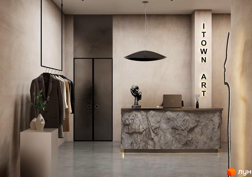 ITown ART Apartments: сучасний інтер'єр рецепції з дизайнерським освітленням та одягом на вішалках. Приймальна зона з кам'яною стійкою та ноутбуком.