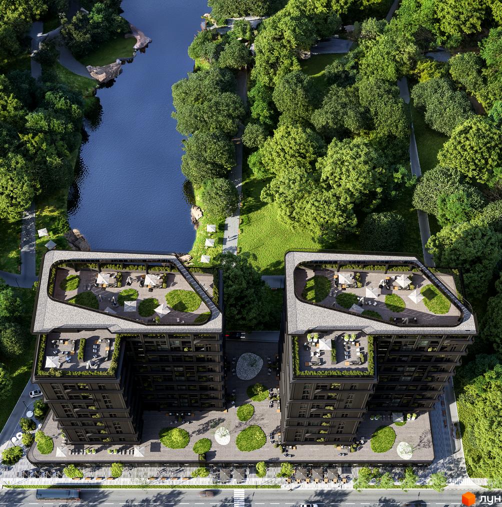 Вид зверху на Будівельний проєкт PARK AVENUE premium з озелененими терасами, поруч зелені насадження та водойма.