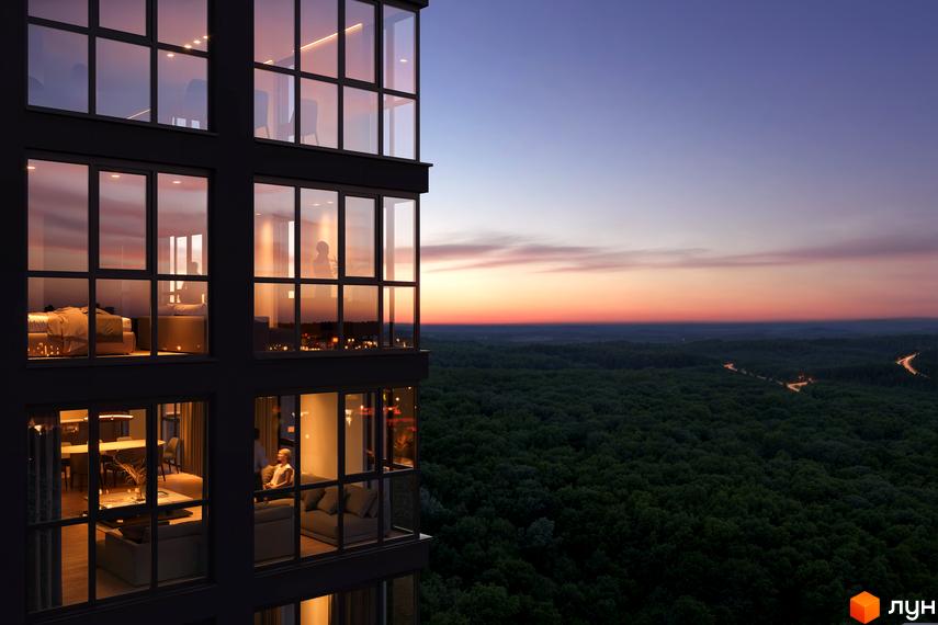 Житловий комплекс Avalon Up з панорамними вікнами та видом на ліс на заході сонця. Сучасна архітектура новобудови.