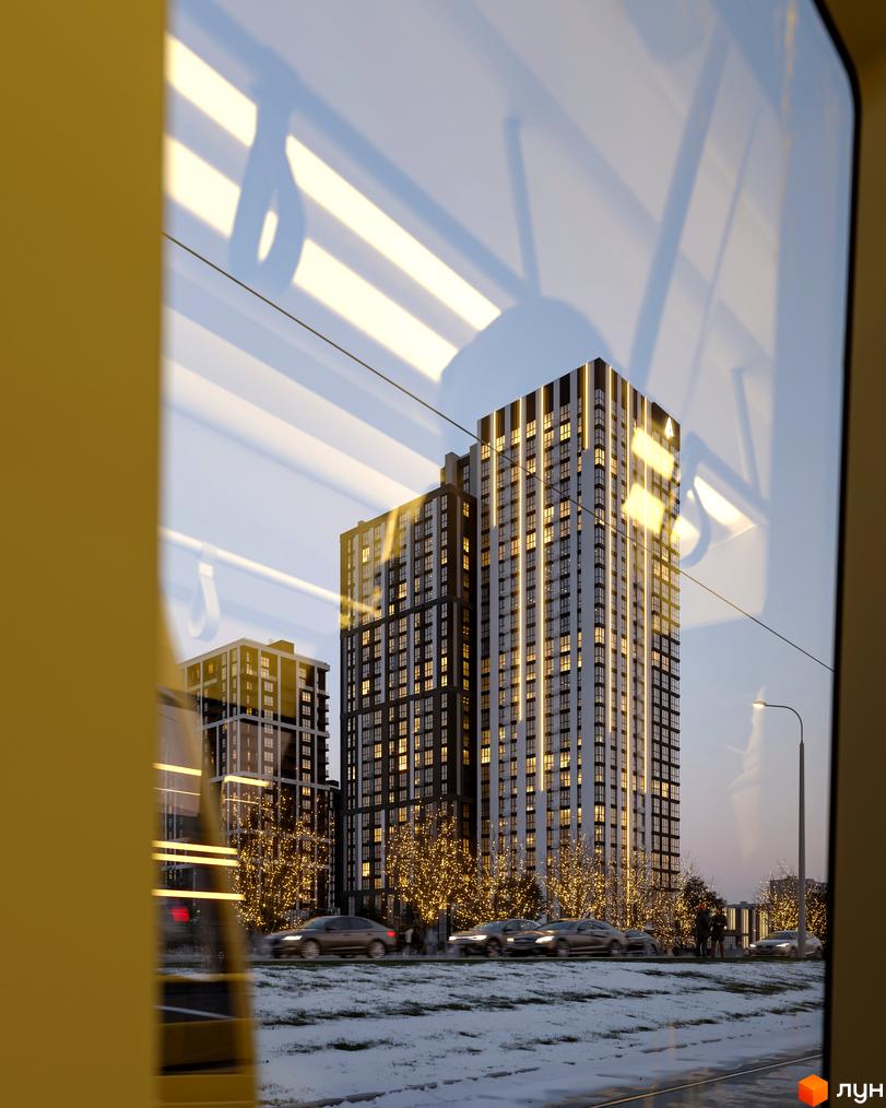 Житловий комплекс Avalon Up. Сучасні висотні будинки з підсвіченими фасадами, розташовані біля дороги з автомобілями та деревами, прикрашеними гірляндами.