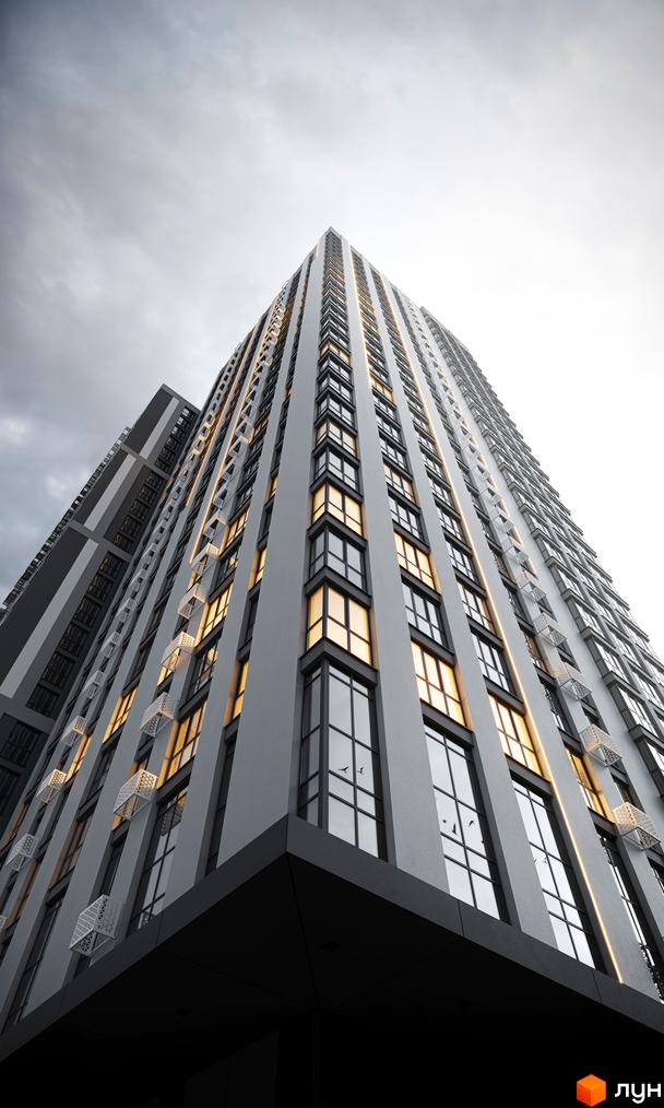 Зовнішній вигляд новобудови ЖК Avalon Up з панорамними вікнами та підсвіткою. Сучасна архітектура висотної будівлі.