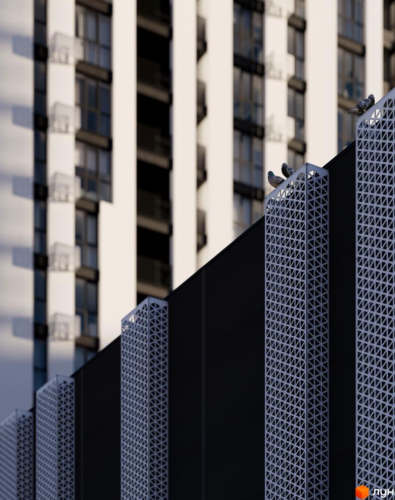 Житловий комплекс Avalon Up має білий фасад з темними вікнами та декоративними панелями.