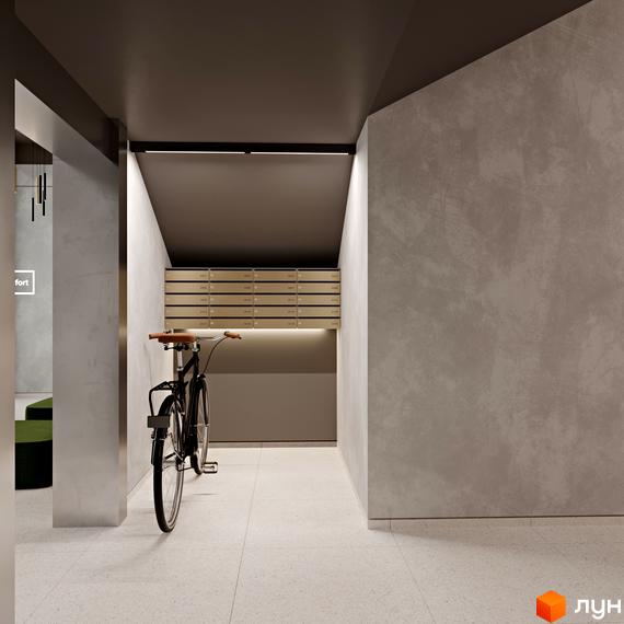 Сучасний вхід у житловий комплекс PRAUD comfort з велосипедом та поштовими скриньками.