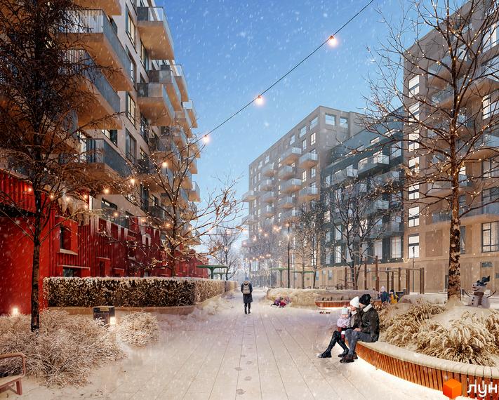 Зимовий пейзаж ЖК Felicity: багатоповерхові будинки з балконами, засніжена прибудинкова територія з ліхтарями та деревами, люди відпочивають.