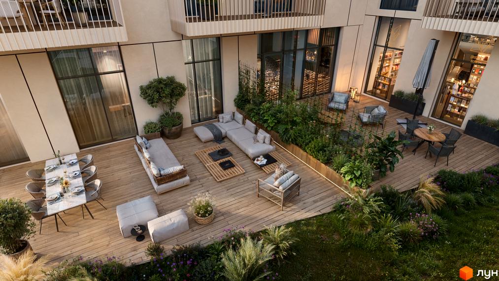 Зображення сторінки ЖК SOUL PARK з видом на терасу з меблями та зеленню, що створює затишну атмосферу для відпочинку.