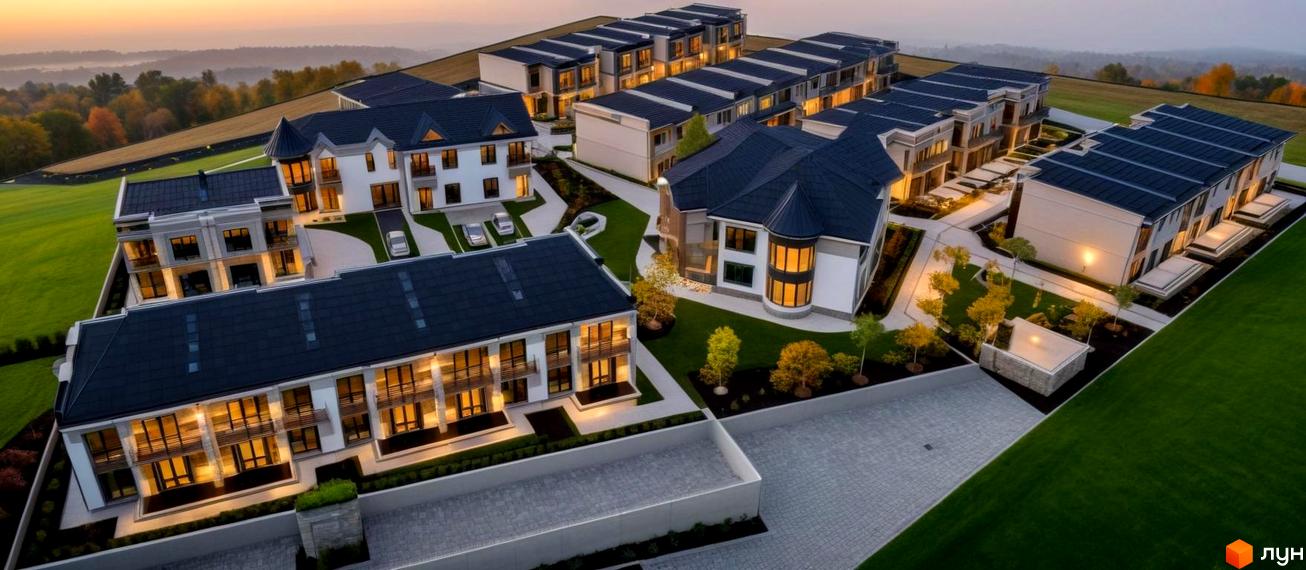 Житловий комплекс Elite Home II з сучасними фасадами та темними дахами, розташований на схилі пагорба серед зелених газонів та дерев.