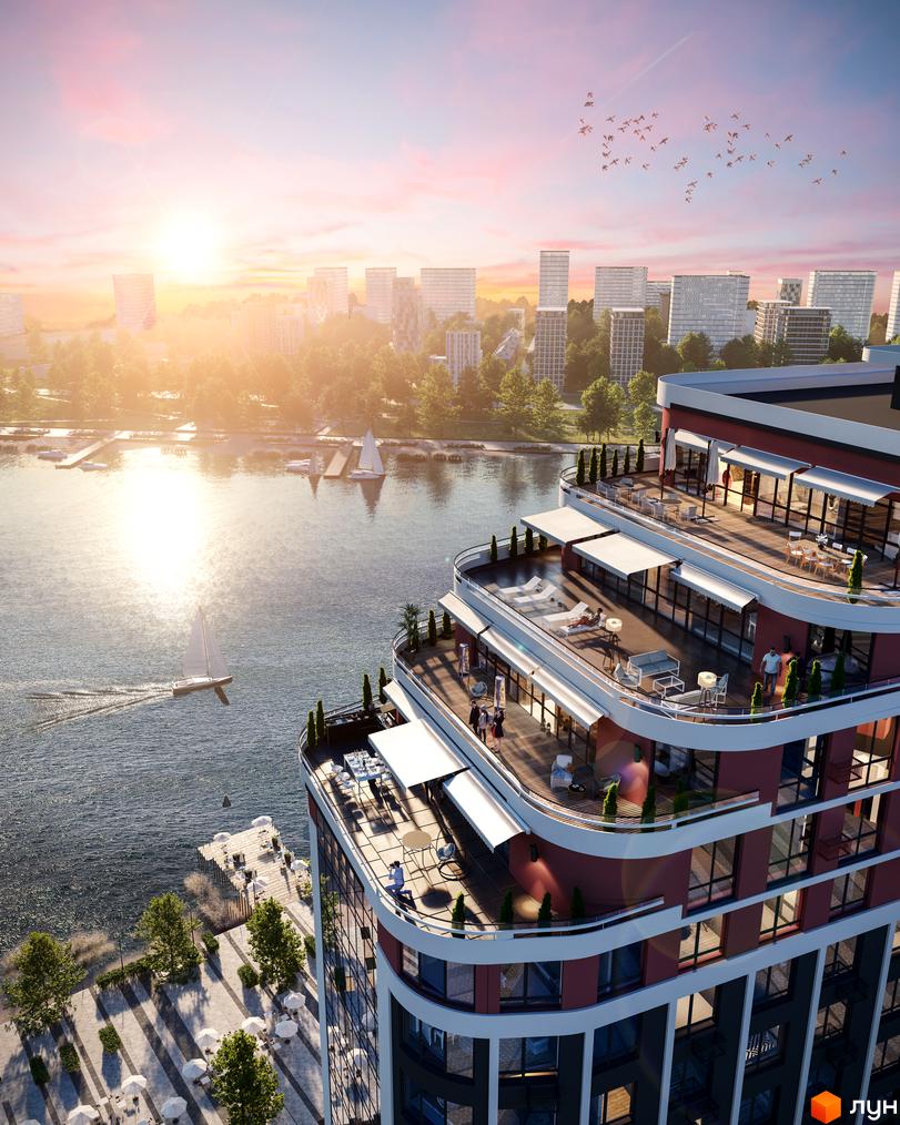 Житловий комплекс H2O з терасами біля річки. Вигляд зверху на будинок з панорамними вікнами та прибережну зону з яхтами.