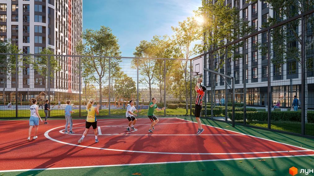 Зображення баскетбольного майданчика в Житловому комплексі H2O. На задньому плані висотні будинки та зелені насадження.