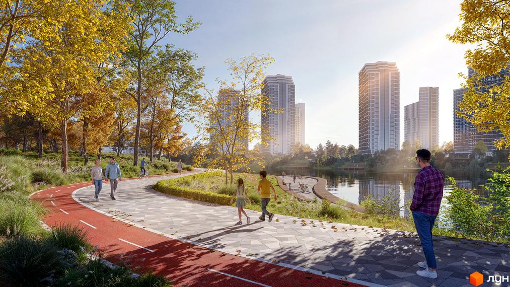 Житловий комплекс H2O з висотними будинками біля озера. Навколо новобудови облаштована пішохідна зона з доріжками для прогулянок.