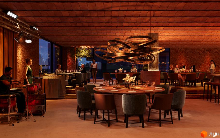 Інтер'єр ресторану з живою музикою, де відвідувачі насолоджуються вечерею та напоями. Затишна атмосфера для відпочинку та святкування.