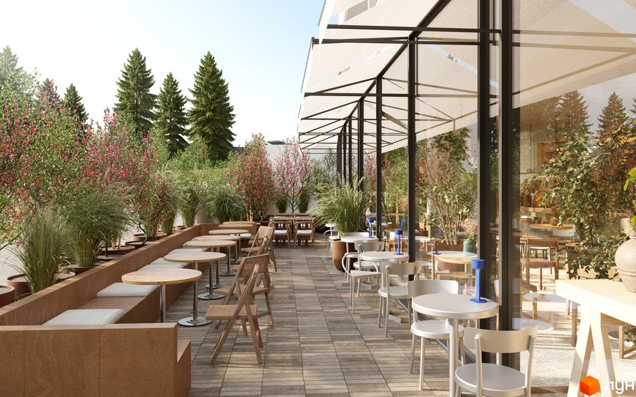 Зовнішній вигляд FOMICH TOWN з терасою, столиками та зеленню. Затишна зона відпочинку на свіжому повітрі.