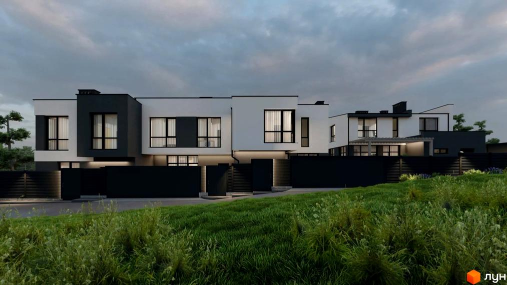 Зовнішній вигляд будинків комплексу КМ Etalon Hillside з великими вікнами та чорними парканами. Навколо будинків – зелена трава та дерева під хмарним небом.