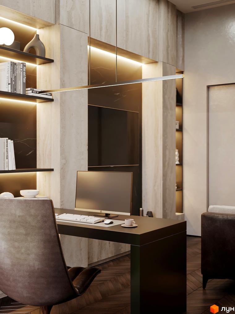 Інтер'єр кабінету в житловому комплексі КМ Equides Villas з робочим столом, комп'ютером та кріслом. На полицях розташовані книги та декор.