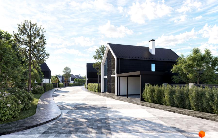 Котеджне містечко Ovillas: чорні будинки з білими трубами та навісами, вимощені доріжки та зелені насадження.