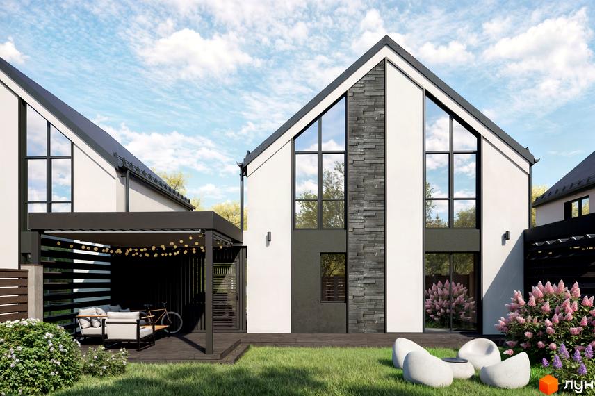 Котеджне містечко Ovillas з білою фасадною частиною, великими вікнами та кам'яним оздобленням. На прибудинковій території розташована тераса з меблями та зелений газон.