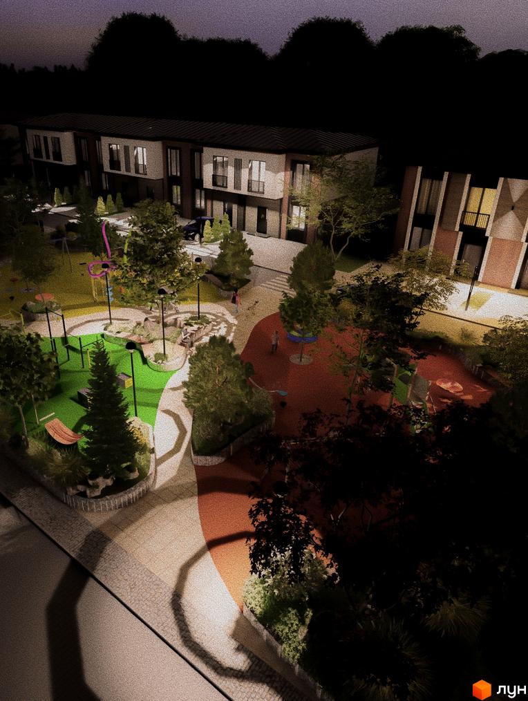 Котеджне містечко КМ Garden Village Petropavlivka. Сучасні будинки з вікнами та балконами, освітлена прибудинкова територія з дитячим майданчиком та зеленими насадженнями.