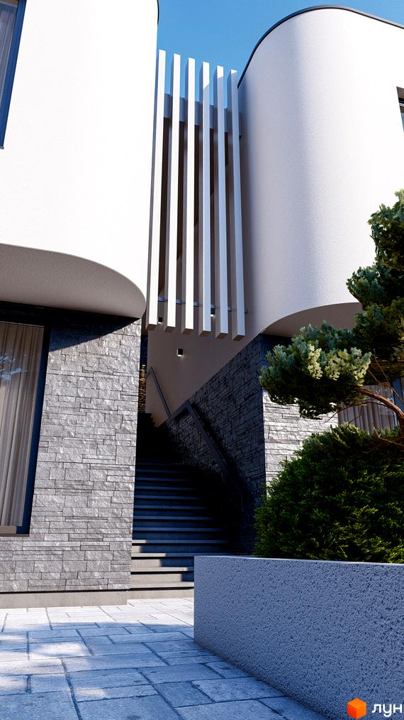 Котеджне містечко TOSCANA CITY: фасад будинку з сірим каменем, білими виступами та сходами, що ведуть до входу. Прибудинкова територія з бруківкою та зеленню.