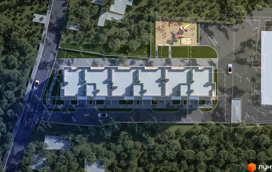 Вигляд зверху на Житловий комплекс Київські Зорі з дитячим майданчиком та парковкою. Навколо будинку зелені насадження та дорога.