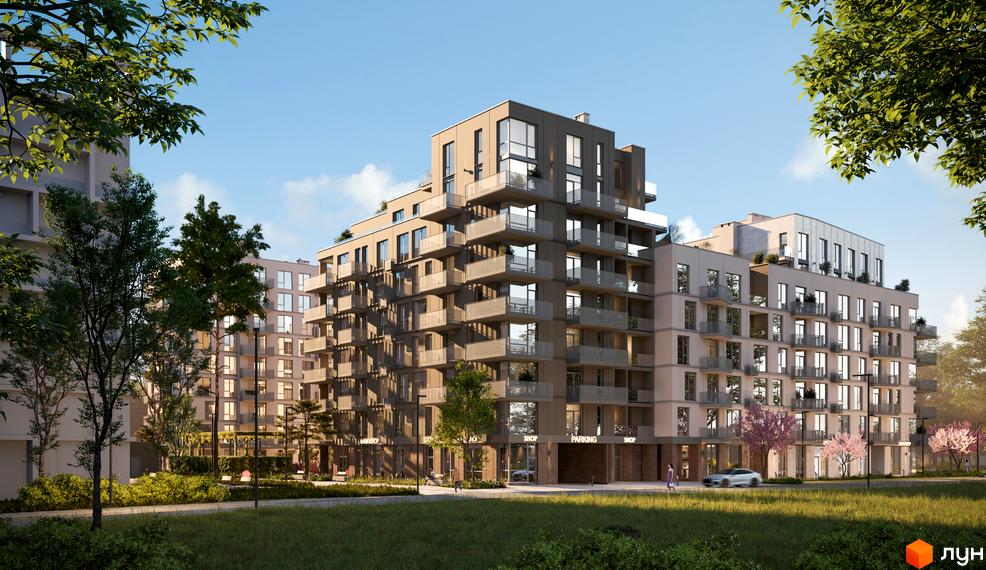 Зовнішній вигляд житлового комплексу ЛЮМ з балконами та великими вікнами. Навколо комплексу зелена прибудинкова територія з деревами та газонами.