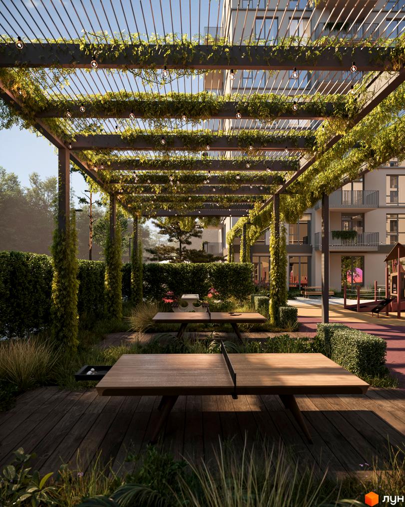 Житловий комплекс ЛЮМ з зеленою зоною відпочинку та дитячим майданчиком. Сучасна архітектура та затишна атмосфера для життя.