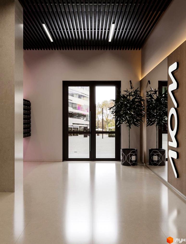 Сучасний вхід у житловий комплекс ЛЮМ з подвійними дверима та елегантним дизайном.