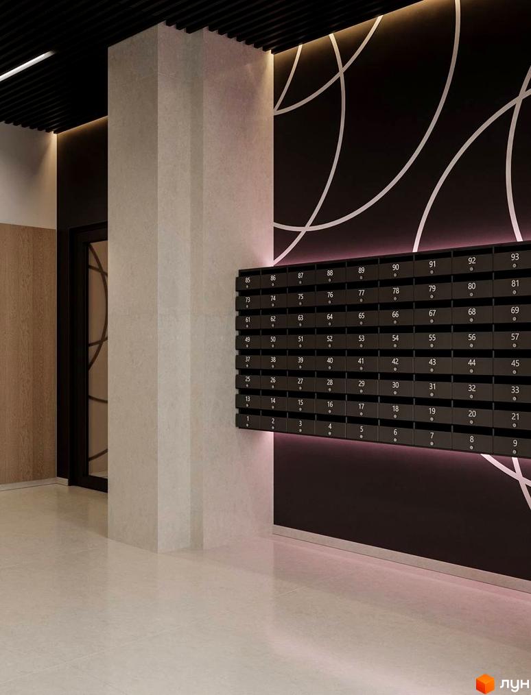 Сучасний дизайн вхідної групи ЖК ЛЮМ з індивідуальними поштовими скриньками та стильним освітленням. Елегантна архітектура та оздоблення створюють затишну атмосферу.