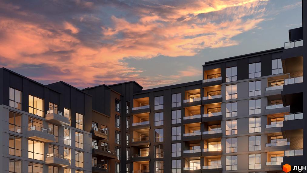 Житловий комплекс AUROOM URBAN з великими вікнами та балконами на тлі заходу сонця. Архітектура будинку в темних тонах, що створює відчуття затишку та комфорту.