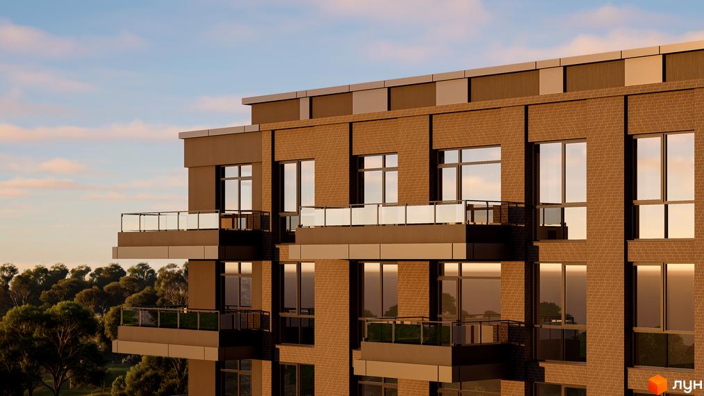 Житловий комплекс AUROOM URBAN з цегляним фасадом та балконами. Навколо будинку зелені насадження та дерева.