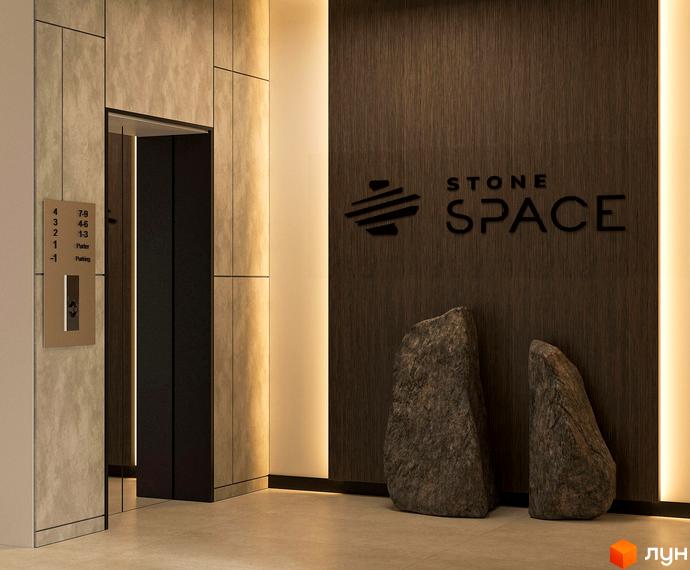 Житловий комплекс Stone Space. Сучасний вхід до ліфта з підсвічуванням та декоративними каменями.