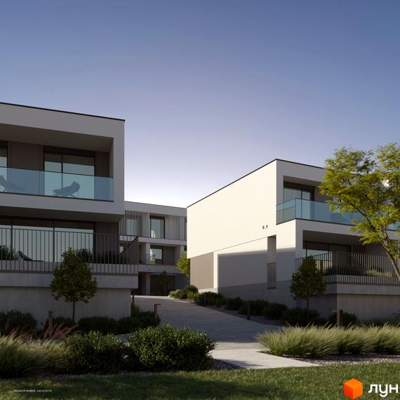 Котеджне містечко Bergman Park - фасади будинків з панорамними вікнами та скляними балконами, доглянута прибудинкова територія з газоном та рослинністю.