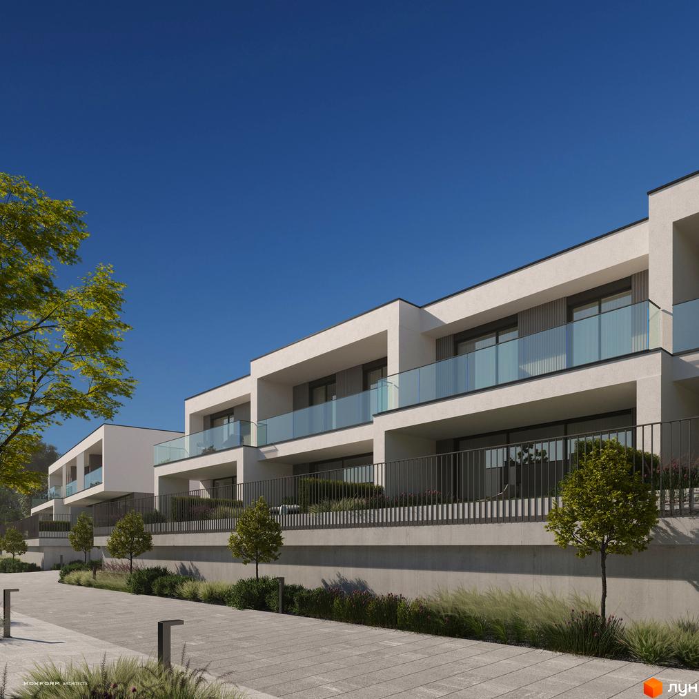 Котеджне містечко Bergman Park. Зовнішній вигляд будинків з балконами та скляними огорожами, доглянута прибудинкова територія з деревами та освітленням.