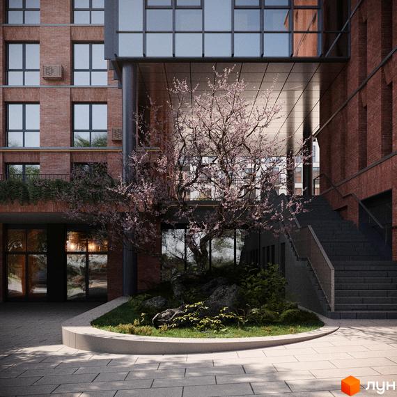 Зовнішній вигляд новобудови ЖК AVANT PARK з цегляним фасадом та скляними елементами. Прибудинкова територія з квітучим деревом та сходами.