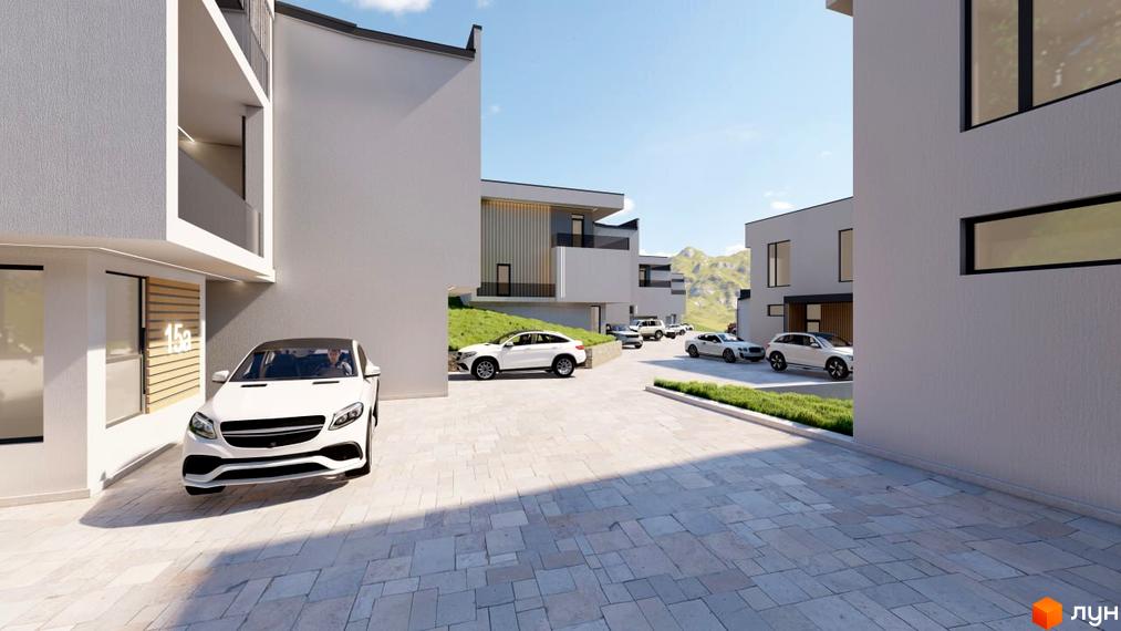 Зовнішній вигляд будинків котеджного містечка КМ Crocus Village з автомобілями на бруківці та зеленими насадженнями.