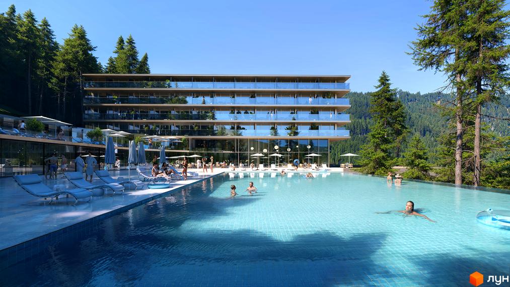 ONDE Hotel by GORO Mountain Resort - це житловий комплекс з басейном та відпочинковою зоною на тлі гірського пейзажу. Будівля має багатоповерхову структуру з терасами та скляними фасадами.