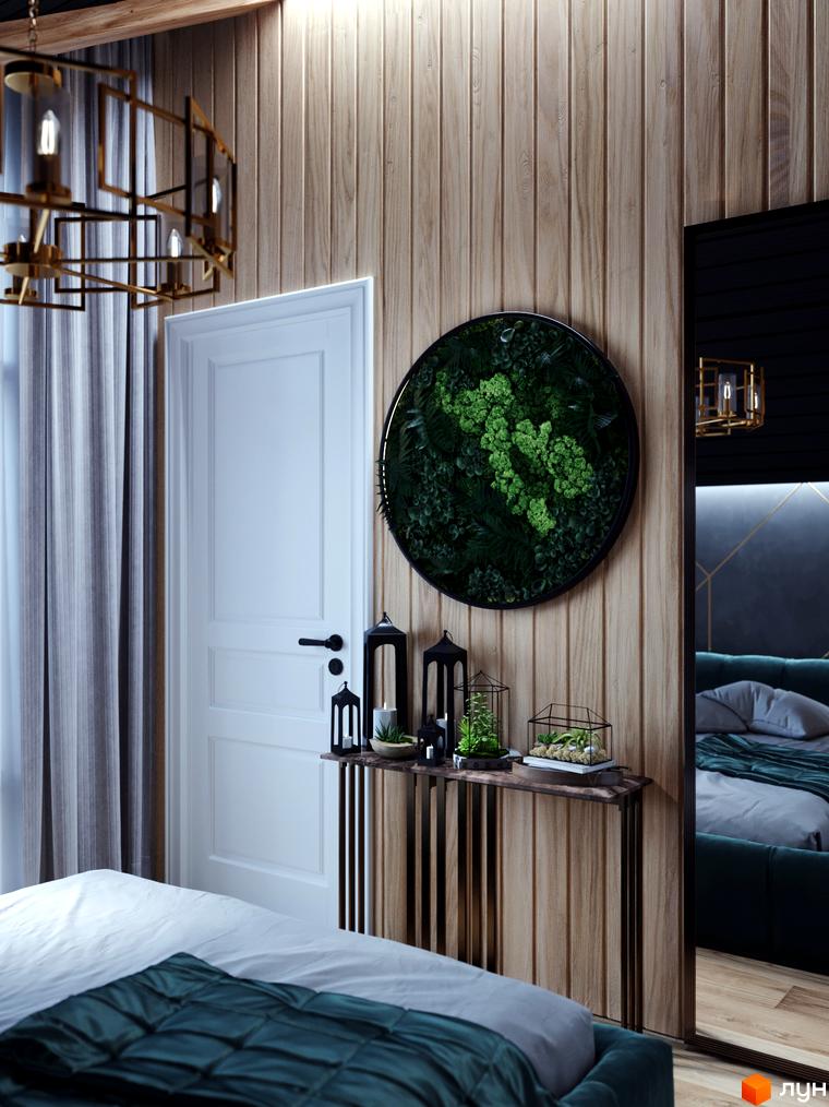 Інтер'єр спальні з дерев'яними панелями та круглою композицією з рослинності. Комплекс КМ GORDO RESIDENCE.