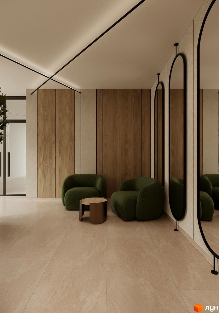 Дизайн інтер'єру вітальні в житловому комплексі Мрія з двома зеленими кріслами та дерев'яною стіною.