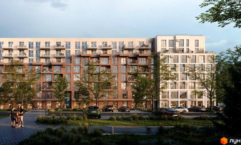 Багатоповерховий будинок з балконами та великими вікнами. Біля будинку розташована прибудинкова територія з деревами та парковкою.