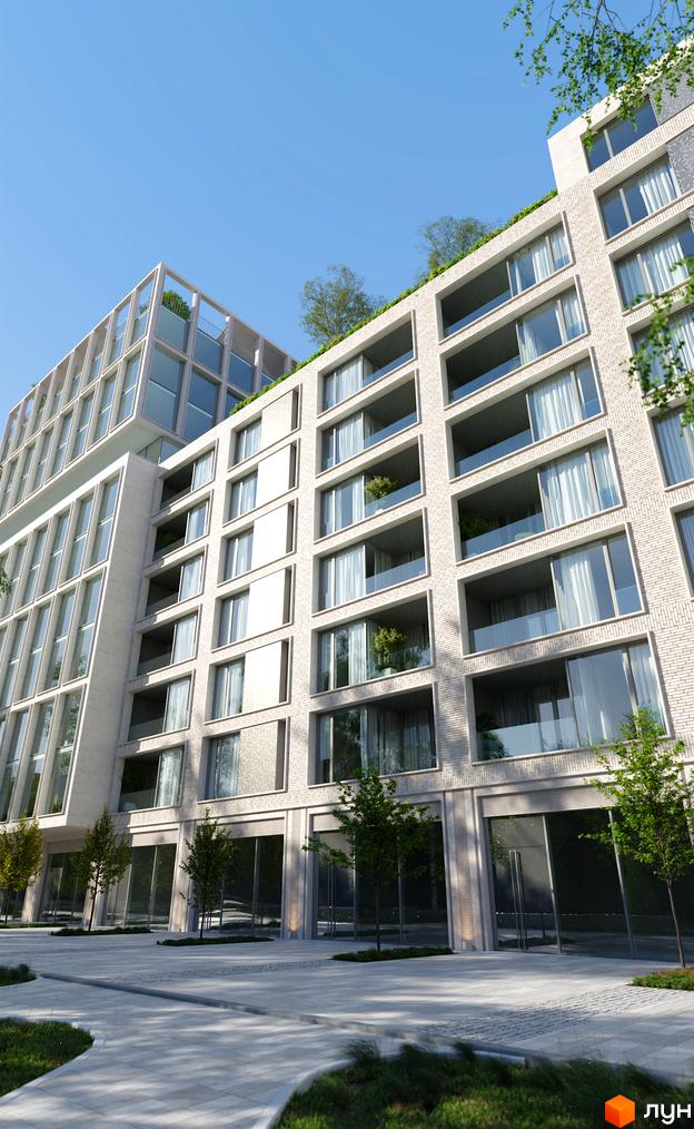 Житловий комплекс MECENAT: фасади з цегли та великі вікна, балкони з скляними огорожами, зелені зони та брукована площадка перед будинком.