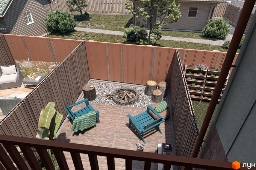 Вигляд на внутрішній дворик Котеджного містечка New Smart 16 з місцем для відпочинку та вогнищем. Територія огороджена дерев'яним парканом.