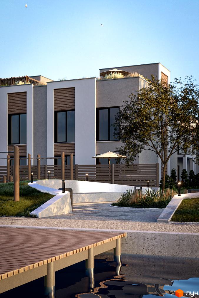 Зовнішній вигляд будинків КМ The Lake з дерев'яним оздобленням та прибудинковою територією з ландшафтним дизайном та пірсом.