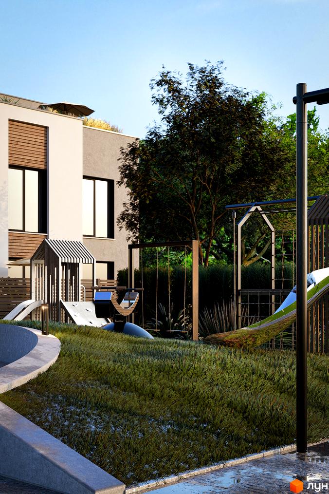 Котеджне містечко The Lake: будівля зі світлим фасадом, дерев'яними вставками та терасою на даху. Поруч зелена зона з дитячим майданчиком.