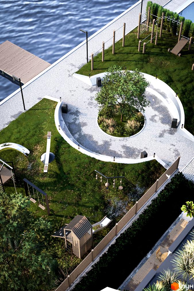 Котеджний комплекс КМ The Lake з зоною відпочинку біля води та дитячим майданчиком. Зелена територія з деревами та елементами для спорту.