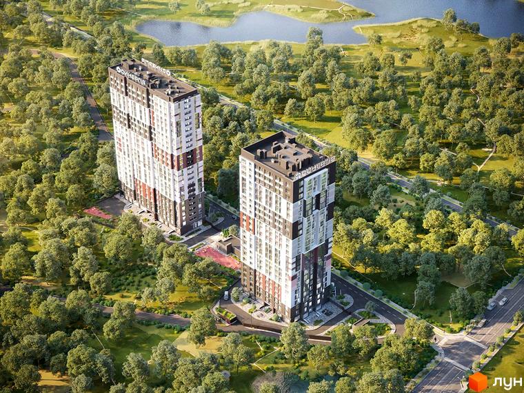 Житловий комплекс Синергія в Києві. Сучасні висотні будинки оточені зеленою зоною та парковими доріжками.