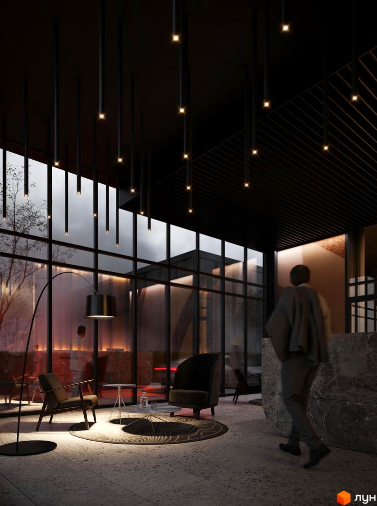 Інтер'єр лобі житлового комплексу Avalon Up з підвісними світильниками та зручними кріслами. Великі вікна відкривають вид на міський пейзаж.
