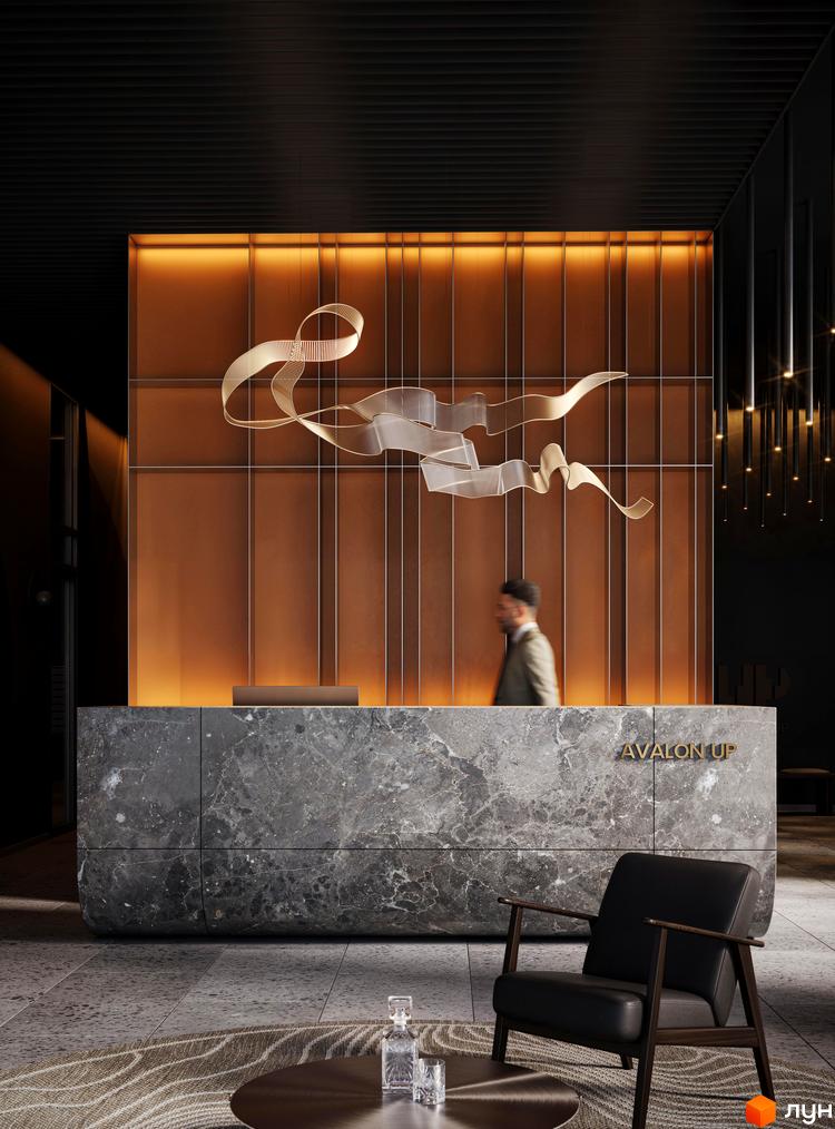 Інтер'єр лобі житлового комплексу Avalon Up з мармуровою стійкою реєстрації та дизайнерським освітленням. Сучасний дизайн простору для зустрічі мешканців та гостей.