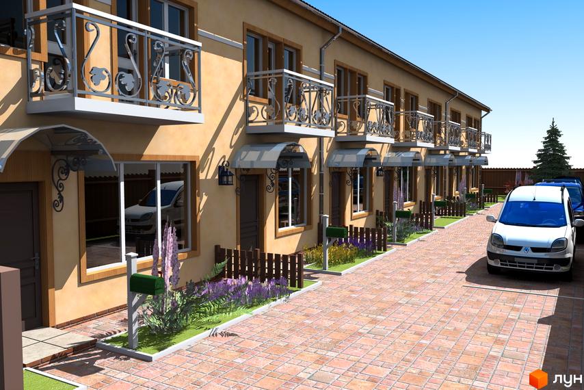 Новобудова на вул. Козацькій, 1: ряд двоповерхових будинків бежевого кольору з балконами та брукованою прибудинковою територією.