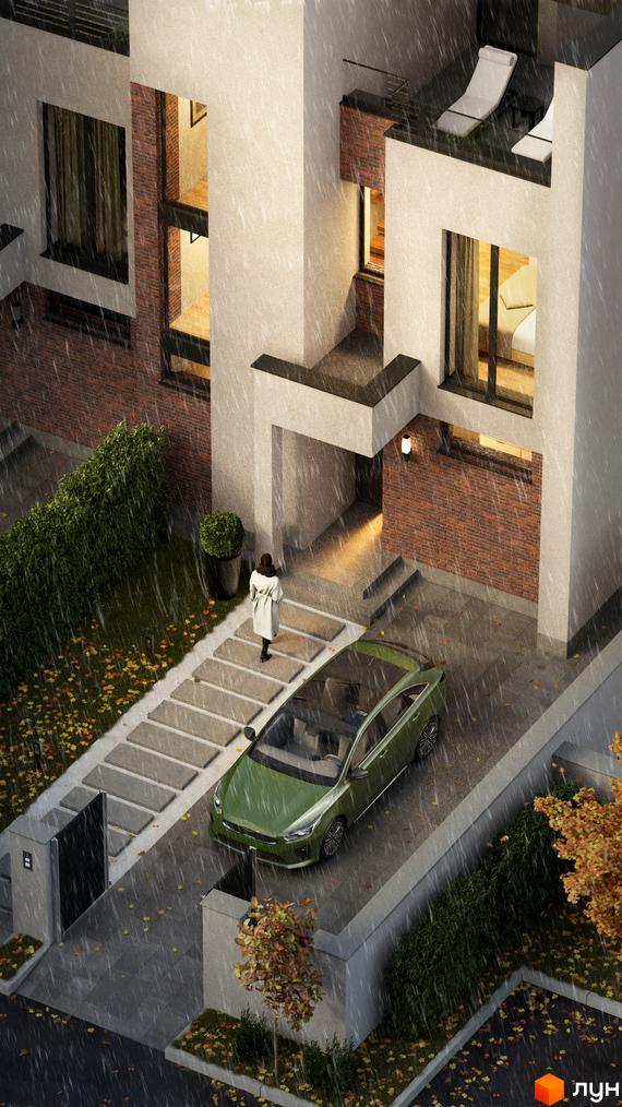 Таунхауси FAMILY PARK RESIDENCE BC з цегляним фасадом та прибудинковою територією з деревами та автомобілем під дощем.