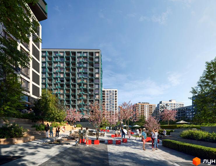 Зображення території Житлового комплексу Dnipro Island з багатоповерховими будинками та місцями для відпочинку.