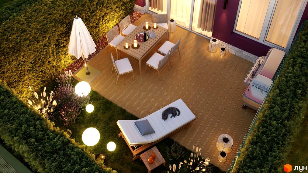 Фасад будинку житлового парку Cuvee Village з великими вікнами та терасою з дерев'яним настилом, обідньою зоною, шезлонгом та доглянутим газоном з підсвічуванням.